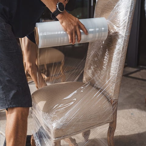 Disassembling furniture and packing belongings for a move