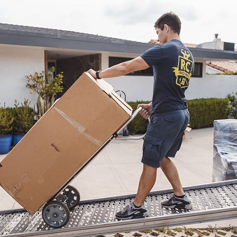 Loading the moving truck and transport to the new address