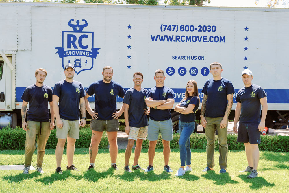 RC Moving team in front of branded moving truck